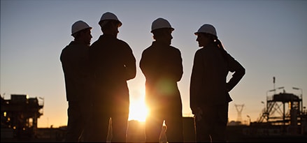 Industrial workers in a group settingIndustrial workers in a group setting